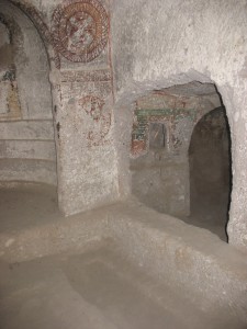 A damaged wall that once separated a chapel from a tomb chamber in Karabaş Church. 